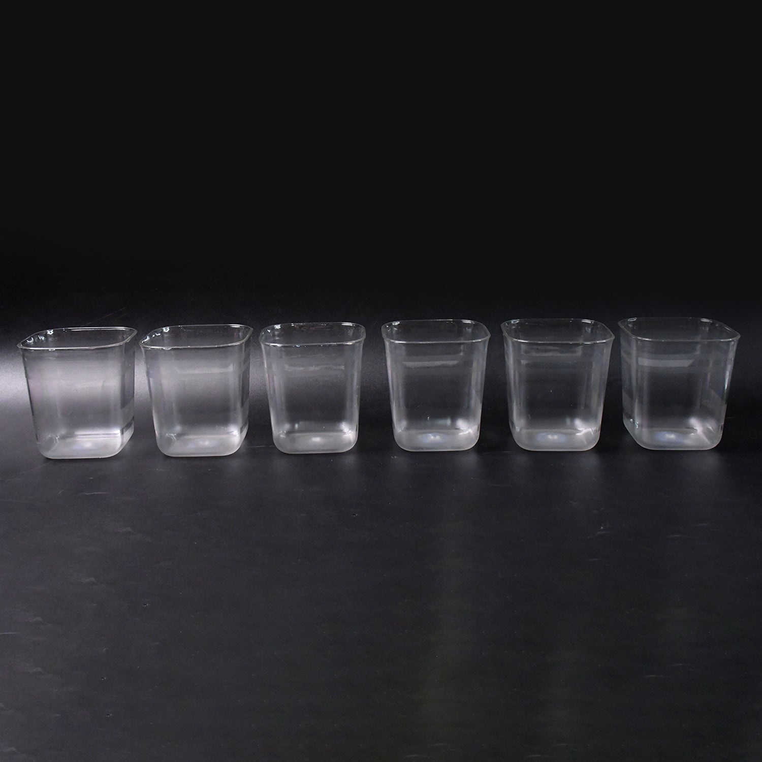 Side view of transparent diamond plastic glass set