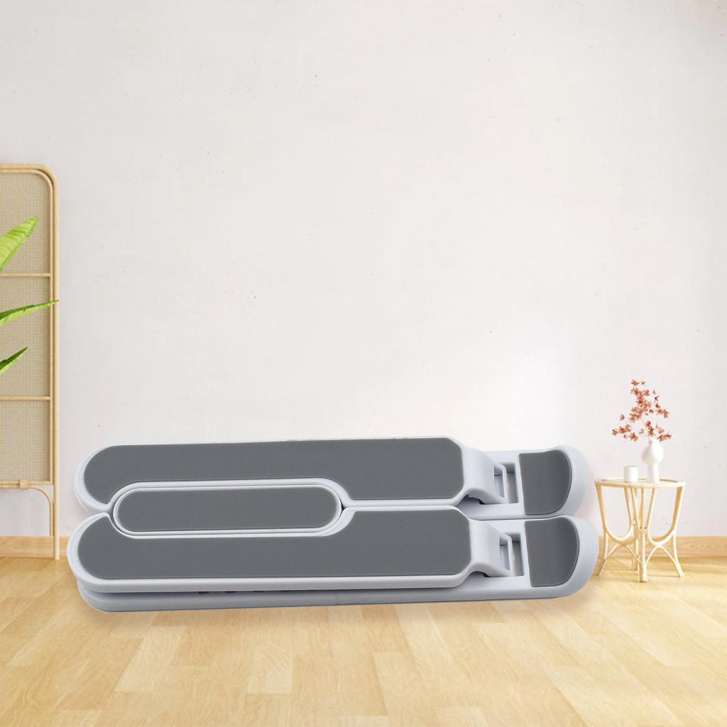 Compact foldable tablet stand with durable fibre construction.