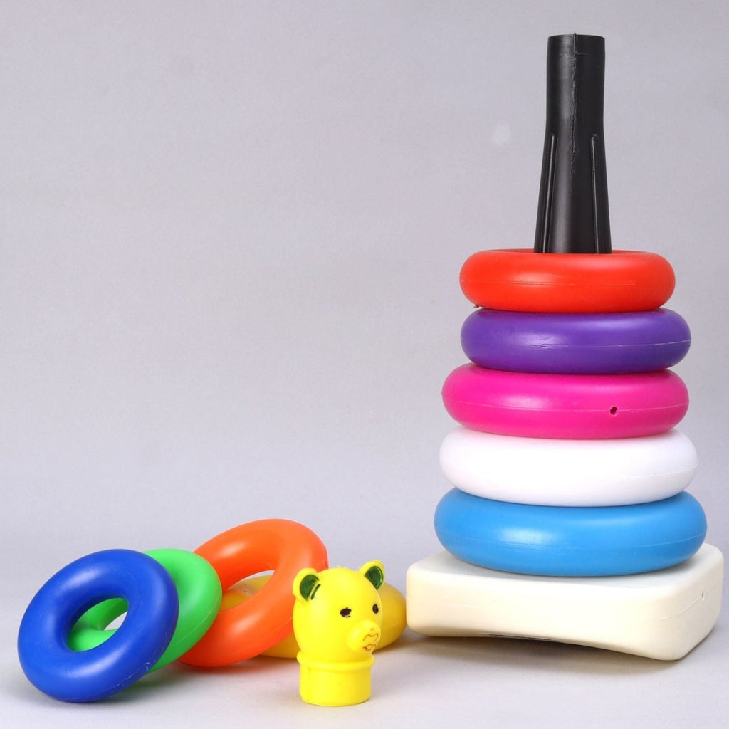 Close-up of the educational teddy bear stacking rings in various bright colors.
