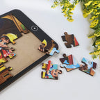 Child's hands assembling a colorful cartoon jigsaw puzzle, promoting focus.