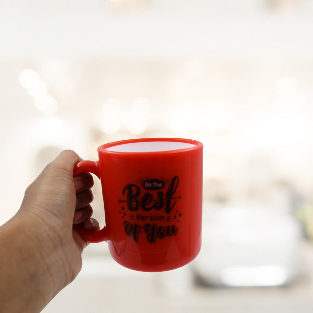 Elegant coffee mug with spoon, perfect for any beverage.