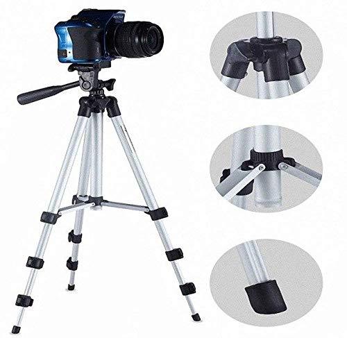 A Gambit camera tripod with a phone holder extended, ready for capturing photos.