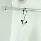 Set of 5 stainless steel S-hooks for home organization.