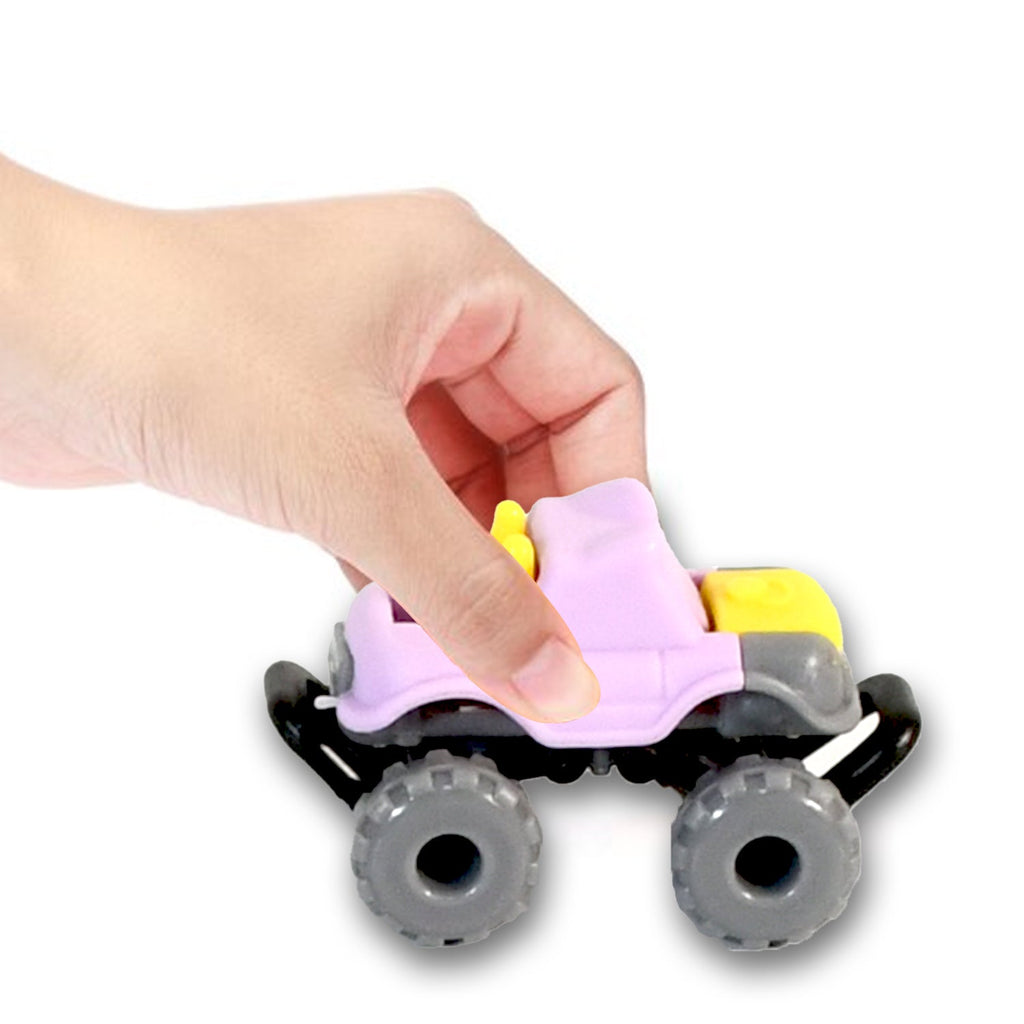 A close-up of a red monster truck toy, demonstrating its durable ABS plastic construction.