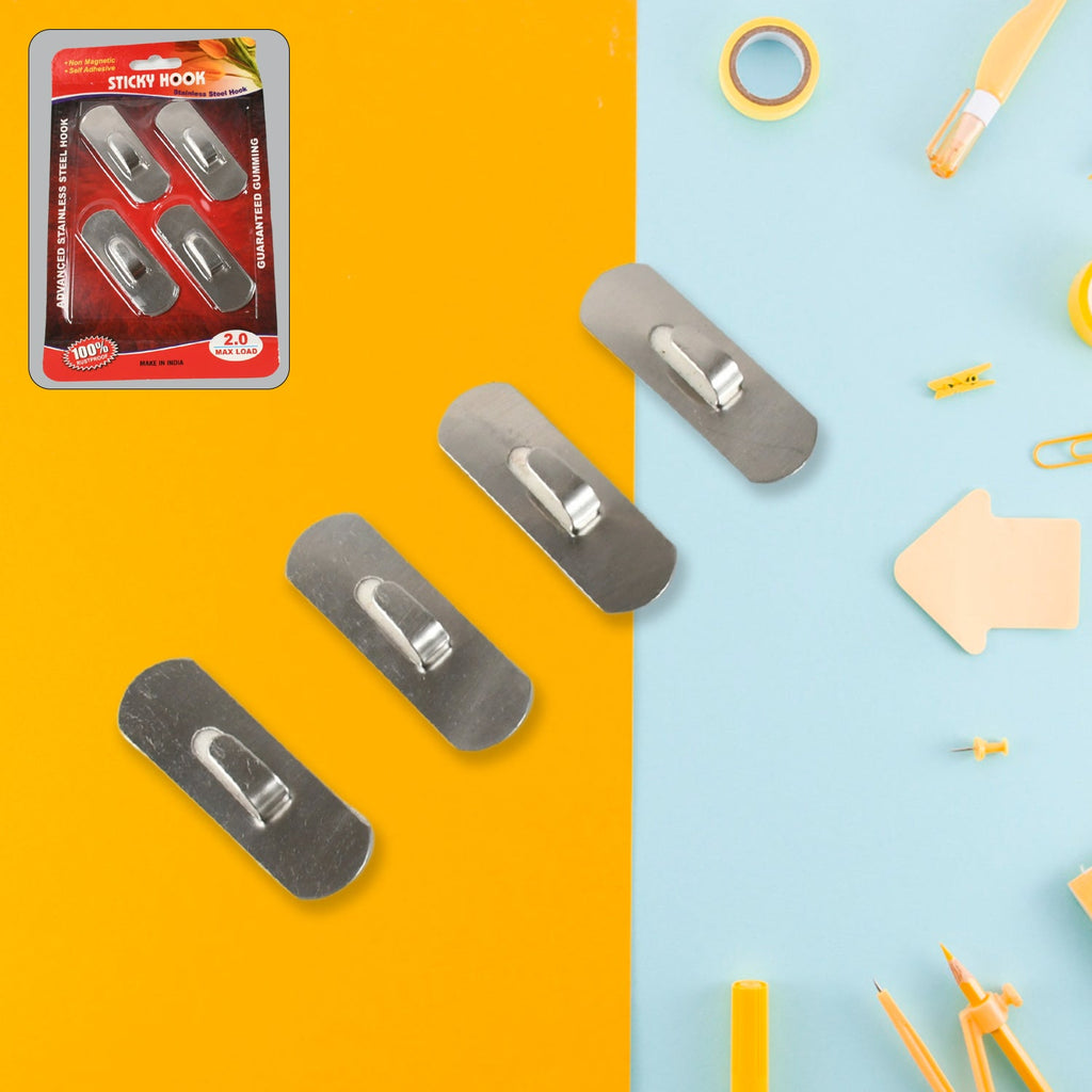 Sleek silver self-adhesive wall hooks securely installed on a smooth, non-porous surface.