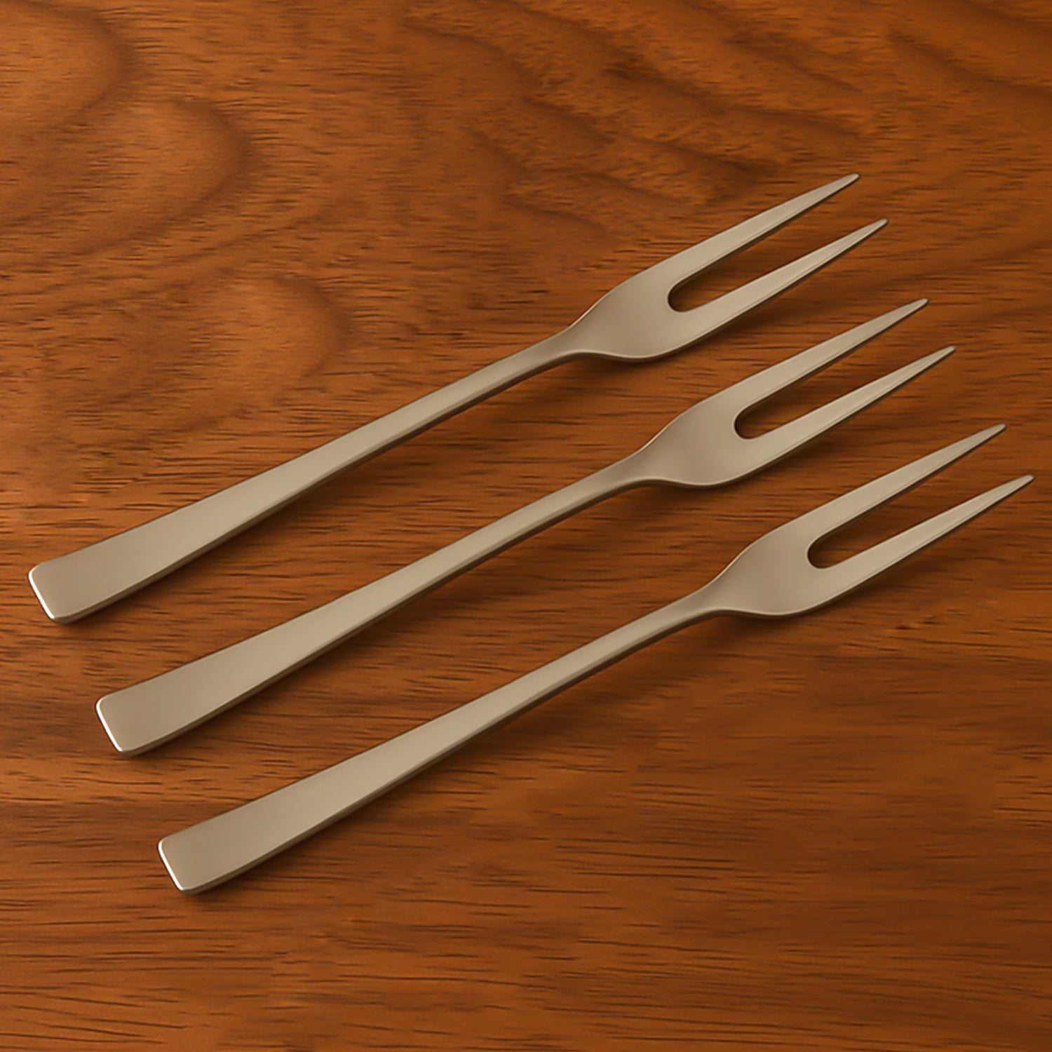 Single mini dessert fork ready for use on a table