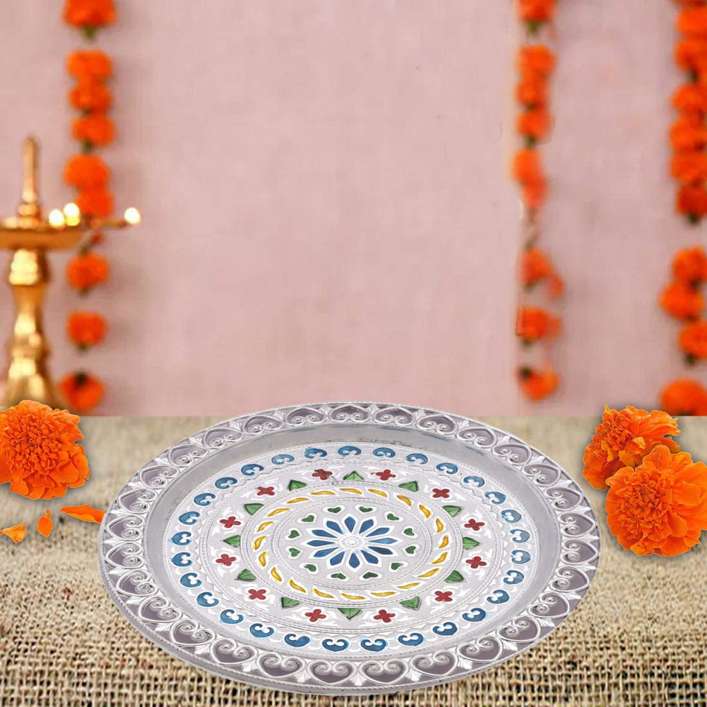 Detailed shot of the high-quality silver plating on the thali, ideal for gifting.
