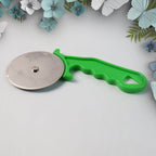 Quickslice stainless steel pizza cutter smoothly slicing a hot, cheesy pizza.