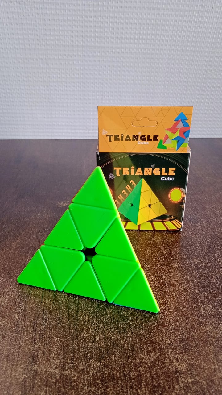 Triangle puzzle cube on desk for brain exercise and play therapy