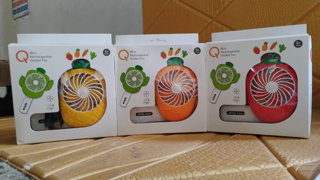 Mini fan shown folded to highlight its portability and compact design