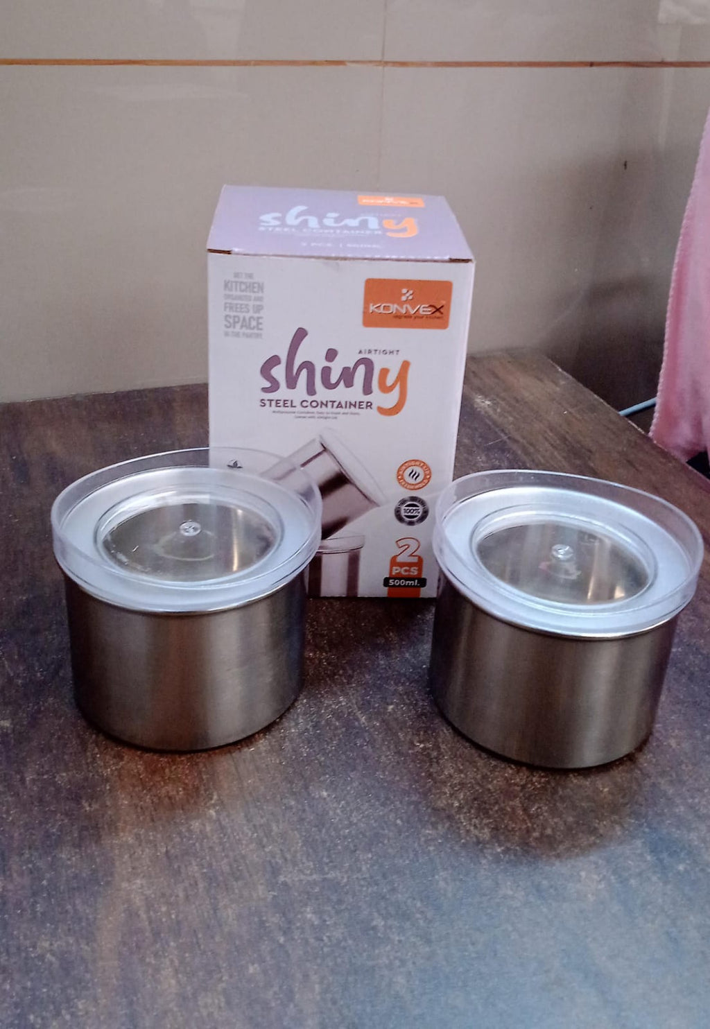 Empty 500ml Konvex stainless steel food storage container with its transparent airtight lid.