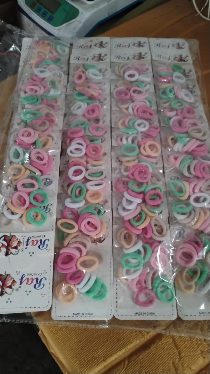 Assorted colorful fabric-covered elastic hair bands for children