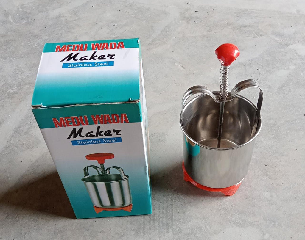 The CookAura Medu Wada Maker, a durable stainless steel tool for making delicious traditional Indian donuts.