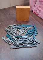 An image illustrating the compact size and easy storage of the 36 Pcs plastic cloth pegs.
