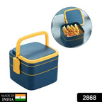 Side view of the stackable blue bento lunch box with carrying handle and spoon.