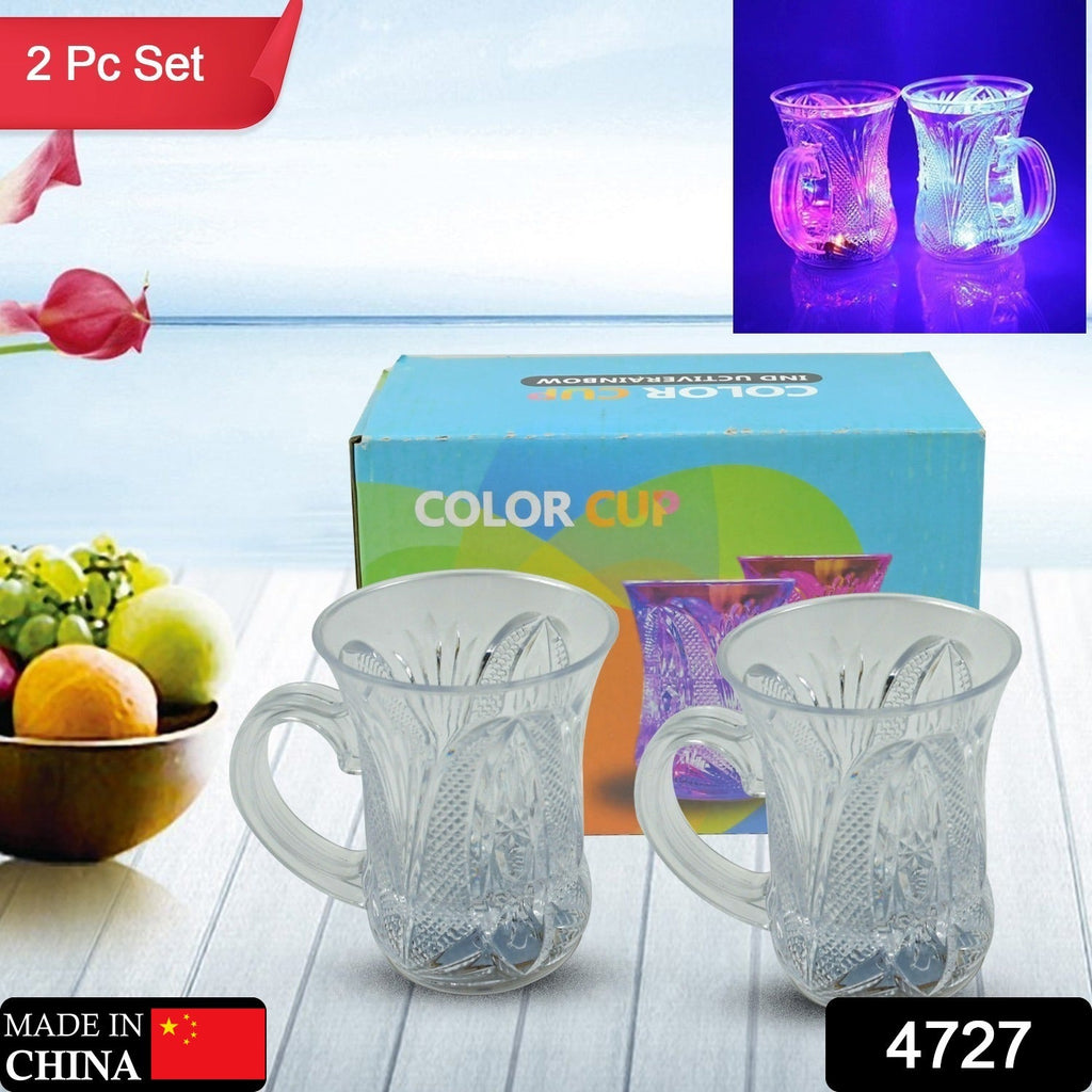 Close-up of a hand holding a clear LED party cup, showing the colorful light effect.