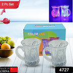 Close-up of a hand holding a clear LED party cup, showing the colorful light effect.