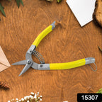 Precision garden snip pruning scissor trimming small plants and herbs