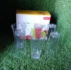 Lifestyle shot of the clear plastic juicy glasses in a modern setting.