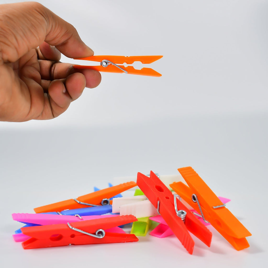 A large 144-piece set of durable plastic clothes clips.