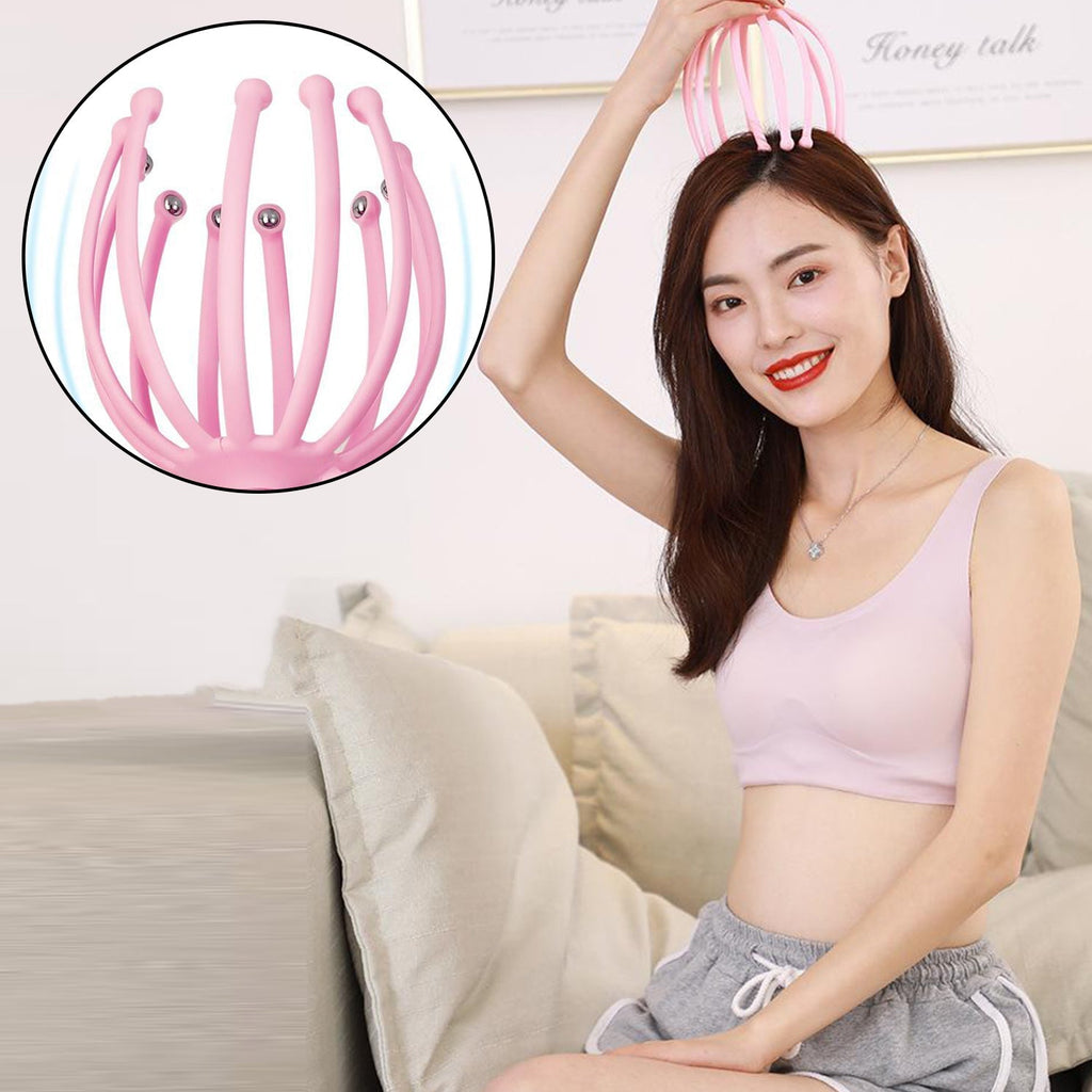 Ergonomic design of the therapeutic scalp massager, held comfortably in hand.