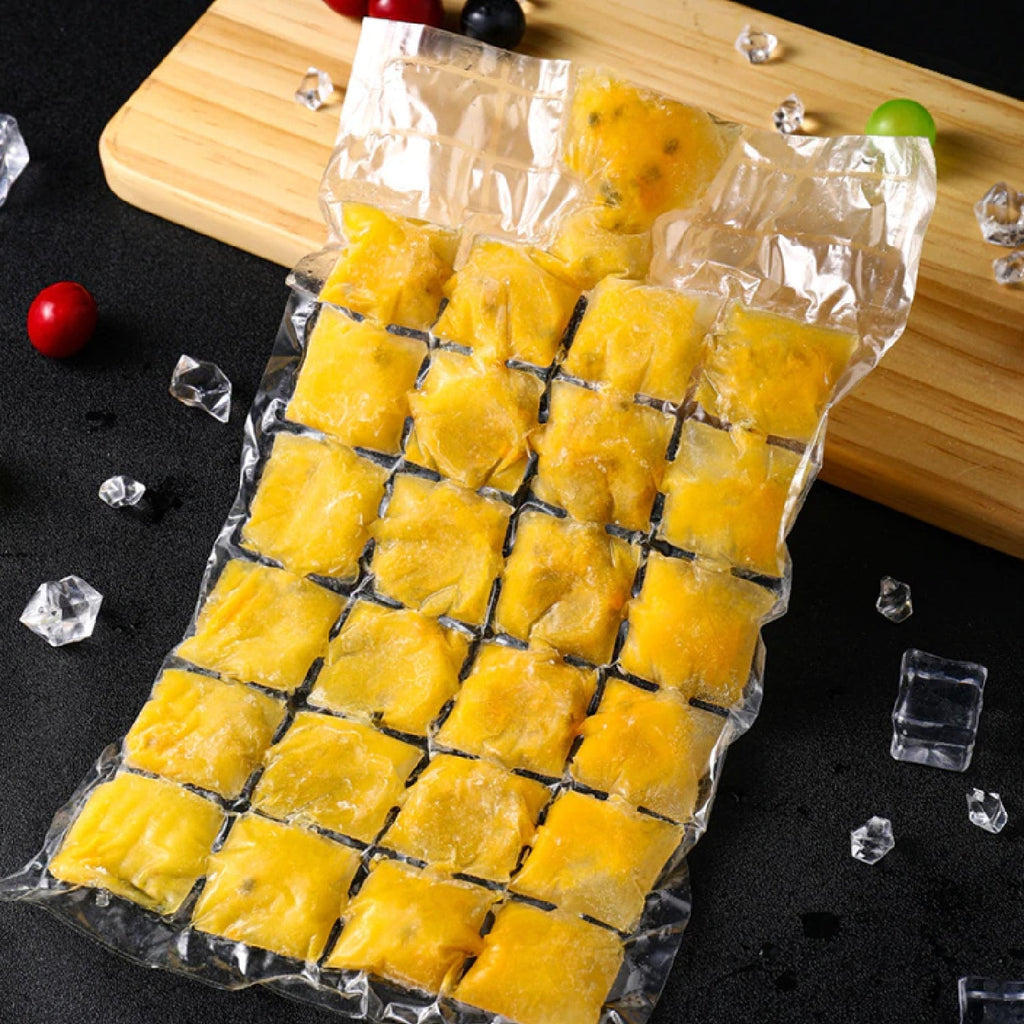 Multiple self-sealing disposable ice cube bags being filled with water for freezing.