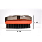 A single wet and dry cleaning brush with a comfortable handle, ideal for daily chores.