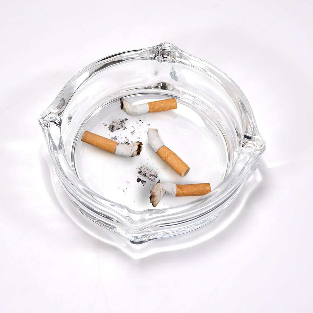Crystal glass ashtray with a unique faceted design, ideal for cigars and cigarettes.