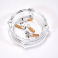 Crystal glass ashtray with a unique faceted design, ideal for cigars and cigarettes.