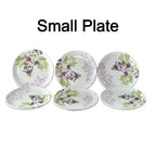 Complete 32-piece plastic dinner set, showcasing various plates and utensils.