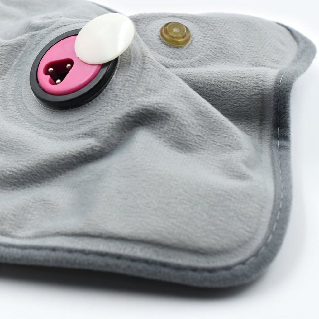 Detailed view of the electric heating pad's soft cloth material for soothing warmth.