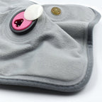 Detailed view of the electric heating pad's soft cloth material for soothing warmth.