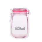 Multiple Organivo 500ml airtight food storage bags neatly organized in a kitchen drawer.