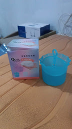 Close-up image of Micro Bubble Foaming Face Cleanser Cup with mesh whisk inside
