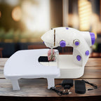 Mini Sewing Machine with extension table, foot pedal, and adapter on a clean surface.