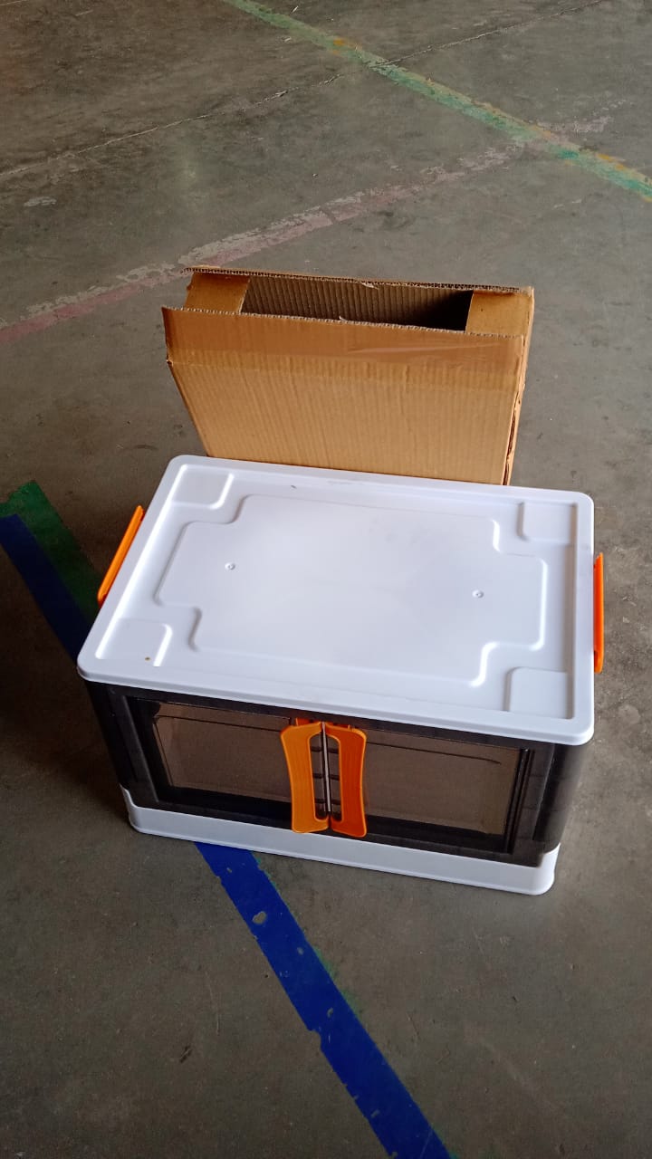 Plastic wardrobe storage container in black and white colors designed for easy organization