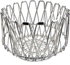 Multipurpose stainless steel wire basket transformed into a stylish fruit bowl for dining.
