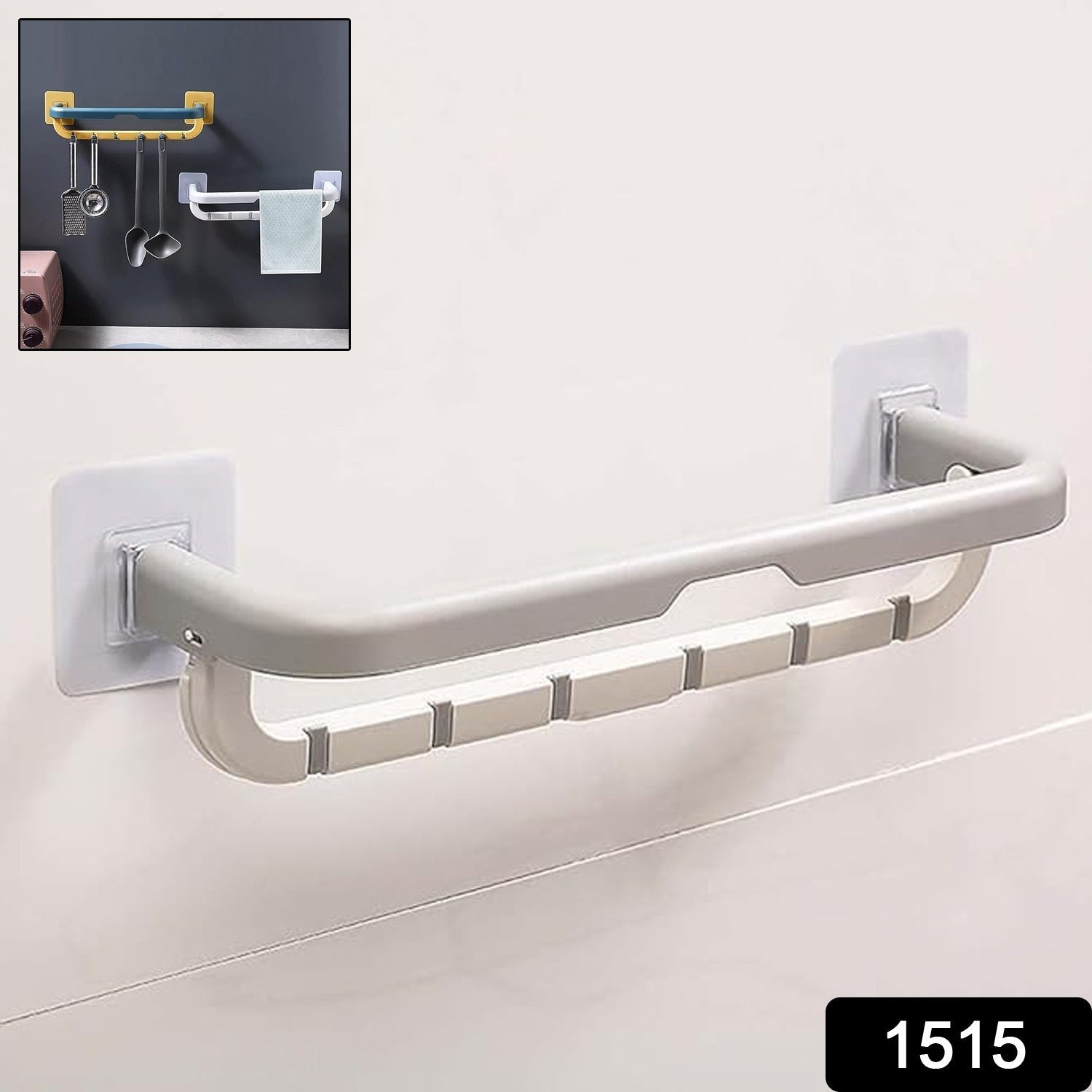 Double bar towel rack neatly holding bath towels and a hand towel.