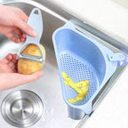 Close-up of the triangular sink drainer shelf's efficient drainage holes.