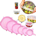 Set of clear silicone stretch lids covering various food containers.