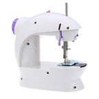 XcelCraft mini sewing machine performing a straight-line stitch on fabric.