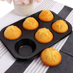 Durable steel cupcake mould with non-stick coating for easy baking.