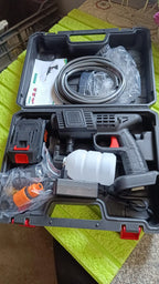 The complete portable pressure washer kit neatly packed in its durable plastic box.