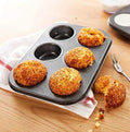 Indo Glow 6-cavity non-stick muffin tray for baking cupcakes.
