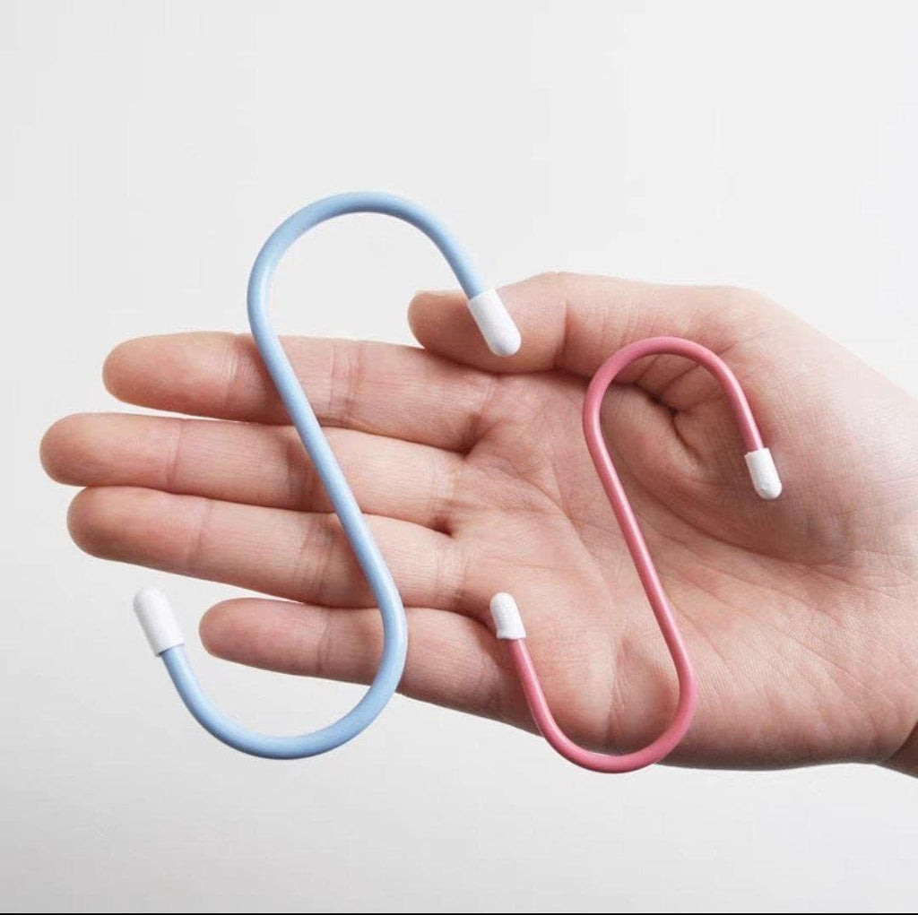 Multiple S hooks on a standard rod, demonstrating their easy application for various items.