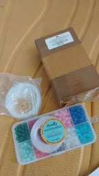 Transparent compartment storage box organizing all components in DIY Jewellery Making Kit