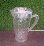 Clear Mocktail PET Plastic Jug with a vibrant orange slice inside, suggesting a refreshing drink.