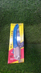 Close-up of the folding mechanism and sharp blade of the gardening hand saw.