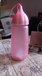 Multiple unique shape plastic water bottles displayed together, showcasing size and design.
