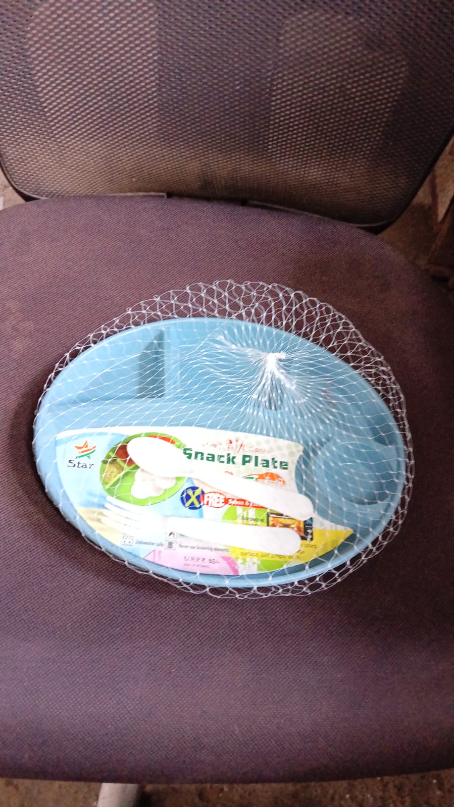 Happy child enjoying a meal from the biodegradable BPA-free kids plate.